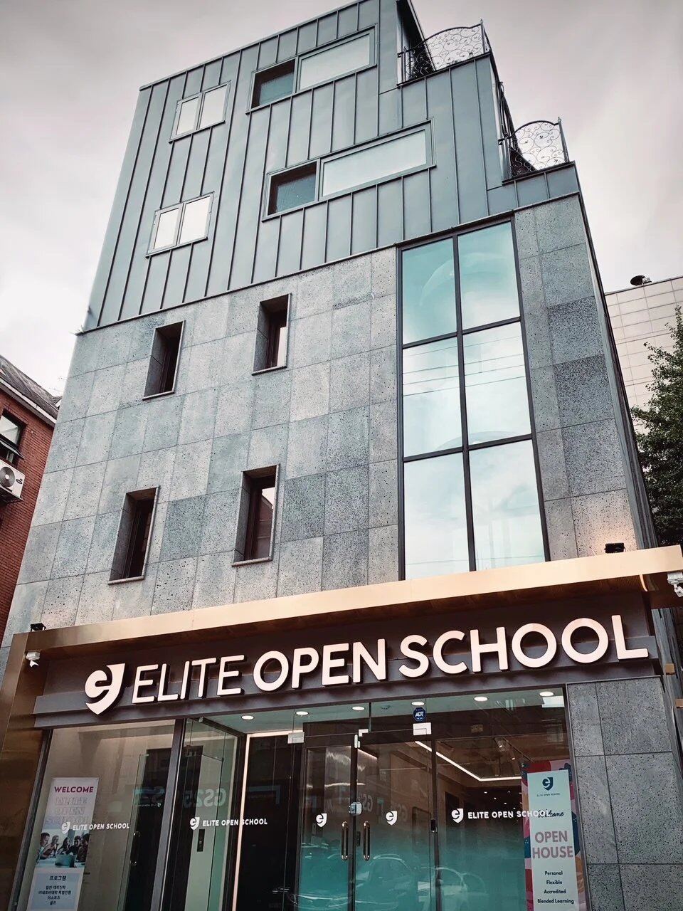 The Elite Open School learning center entrance and signage